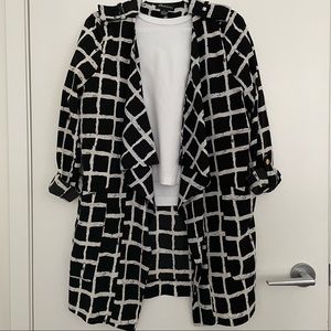 Check print black and white wrap with oversized lapels